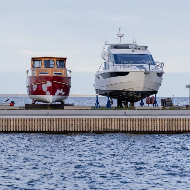 Yachts ashore on the hardstanding at a boatyard